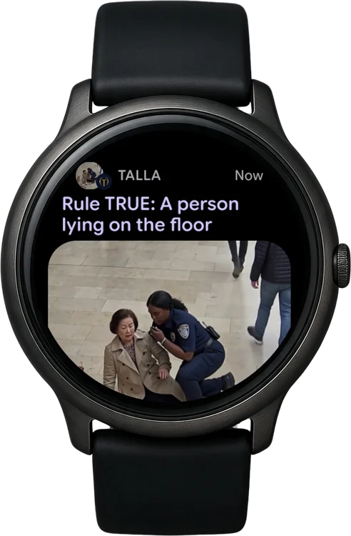 The same alert on a Wear OS watch, with its picture